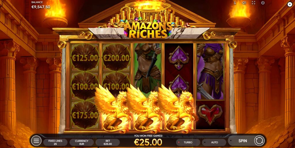Three griffin scatter symbols landing on the reels to trigger the Free Games feature in Amazons Riches.