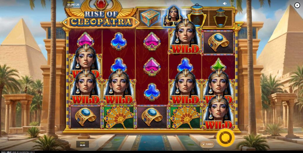 The Random Wilds feature fills the reels with Cleopatra Wild symbols in the Rise of Cleopatra slot.